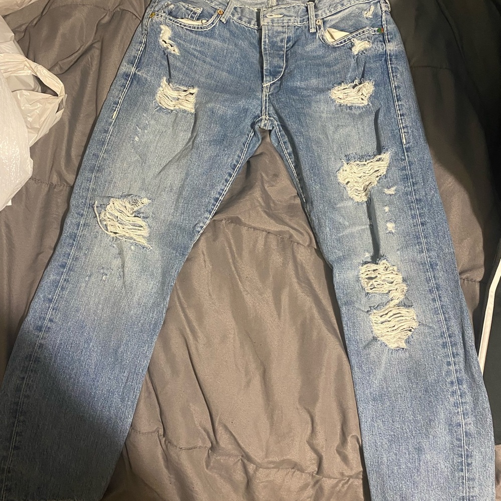 Distressed Blue Jeans